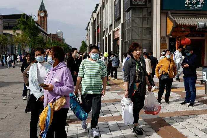 中国家庭消费占 GDP 的比重已趋于稳定。图片来源： Tingshu Wang/Reuters